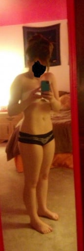 A progress pic of a 5'0" woman showing a snapshot of 114 pounds at a height of 5'0