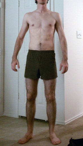 A progress pic of a 6'2" man showing a snapshot of 165 pounds at a height of 6'2