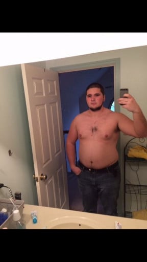 A photo of a 6'3" man showing a fat loss from 300 pounds to 250 pounds. A respectable loss of 50 pounds.