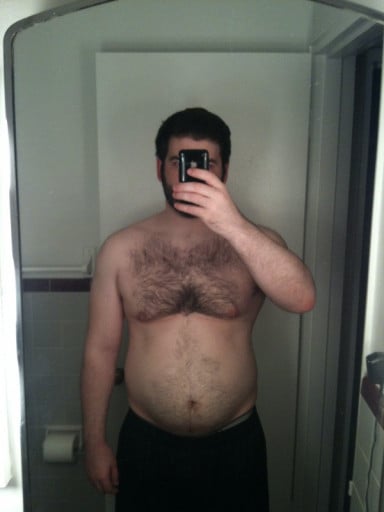 A before and after photo of a 6'0" male showing a weight cut from 250 pounds to 198 pounds. A total loss of 52 pounds.