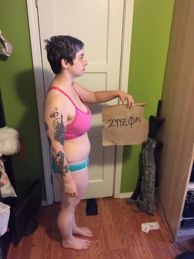 A progress pic of a 5'2" woman showing a snapshot of 143 pounds at a height of 5'2