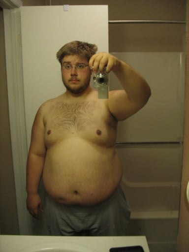 A picture of a 5'9" male showing a weight cut from 365 pounds to 279 pounds. A respectable loss of 86 pounds.