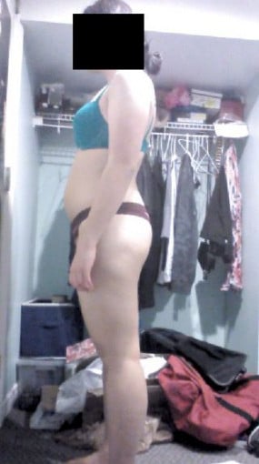 A progress pic of a 5'4" woman showing a snapshot of 157 pounds at a height of 5'4