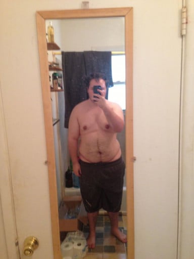 A before and after photo of a 5'5" male showing a weight reduction from 233 pounds to 147 pounds. A respectable loss of 86 pounds.