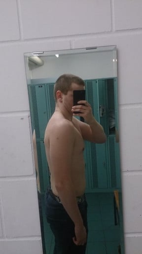 A progress pic of a 6'11" man showing a snapshot of 185 pounds at a height of 6'11