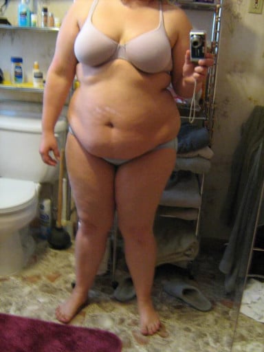 A progress pic of a 5'4" woman showing a snapshot of 244 pounds at a height of 5'4