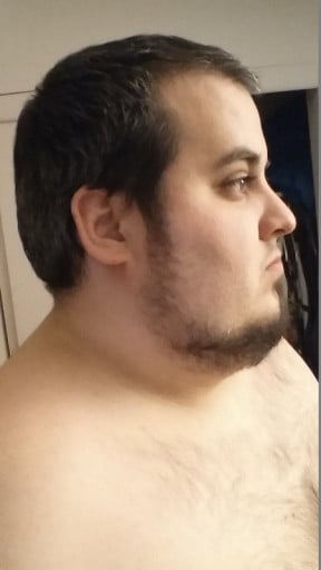 A picture of a 5'11" male showing a weight reduction from 280 pounds to 169 pounds. A net loss of 111 pounds.