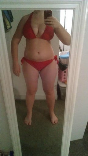 A photo of a 5'5" woman showing a snapshot of 155 pounds at a height of 5'5