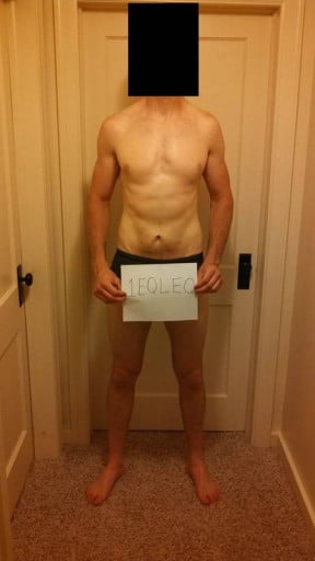 A photo of a 6'5" man showing a snapshot of 185 pounds at a height of 6'5