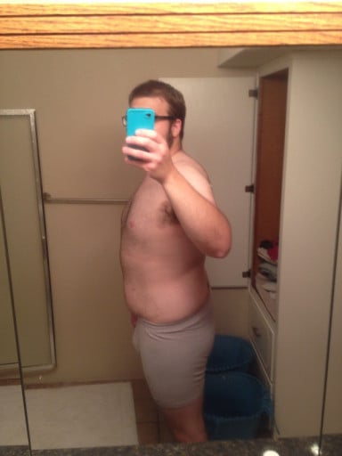 A progress pic of a 5'11" man showing a snapshot of 233 pounds at a height of 5'11