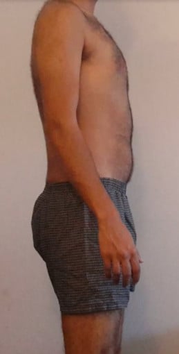 A picture of a 6'0" male showing a snapshot of 169 pounds at a height of 6'0