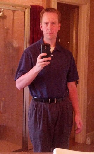 A photo of a 5'9" man showing a weight loss from 262 pounds to 166 pounds. A total loss of 96 pounds.