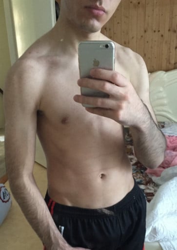 A progress pic of a 5'6" man showing a weight bulk from 130 pounds to 143 pounds. A total gain of 13 pounds.