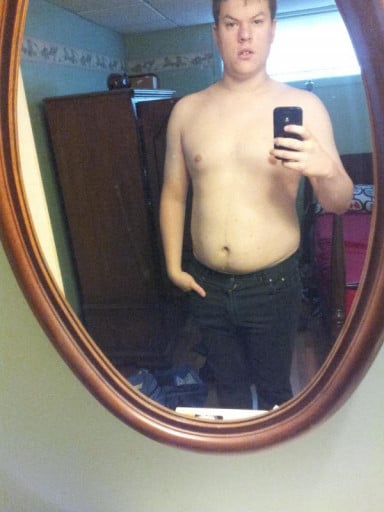 A photo of a 6'2" man showing a weight reduction from 242 pounds to 183 pounds. A total loss of 59 pounds.