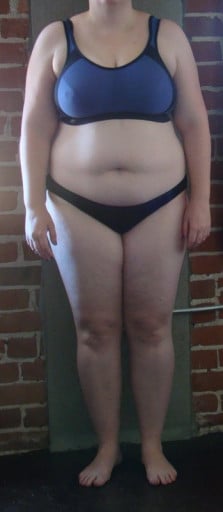 A picture of a 5'4" female showing a snapshot of 218 pounds at a height of 5'4