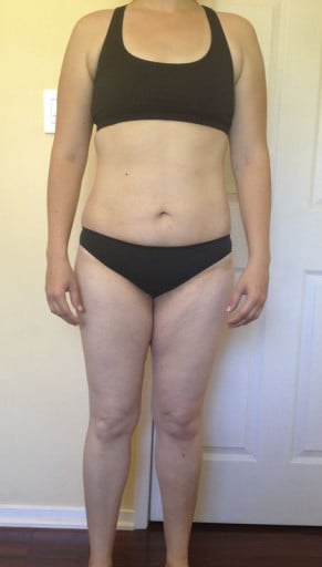 A photo of a 5'7" woman showing a snapshot of 169 pounds at a height of 5'7