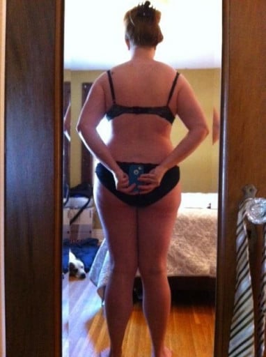 A photo of a 5'11" woman showing a snapshot of 220 pounds at a height of 5'11