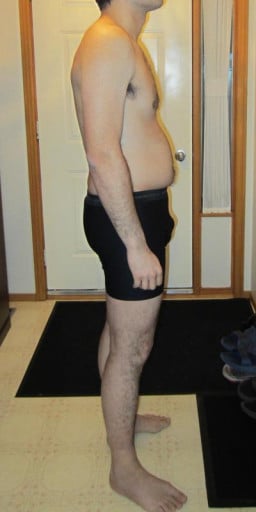 A progress pic of a 5'11" man showing a snapshot of 187 pounds at a height of 5'11