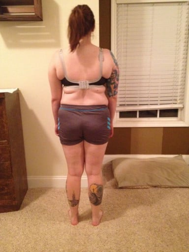 A picture of a 5'8" female showing a snapshot of 182 pounds at a height of 5'8