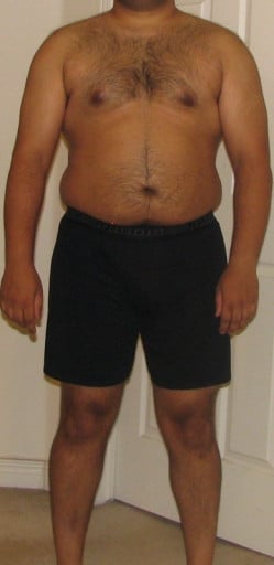 A photo of a 5'8" man showing a snapshot of 214 pounds at a height of 5'8