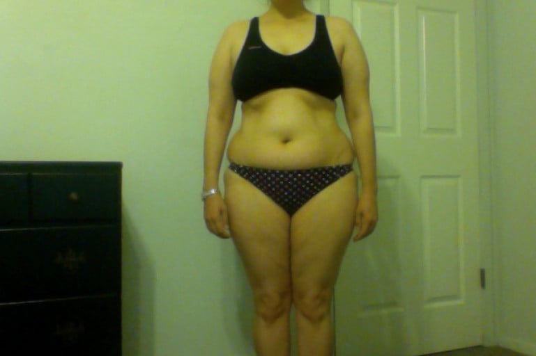 A photo of a 5'2" woman showing a snapshot of 163 pounds at a height of 5'2