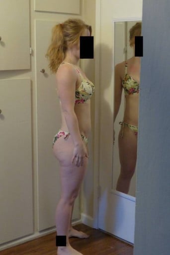 A progress pic of a 5'2" woman showing a snapshot of 121 pounds at a height of 5'2