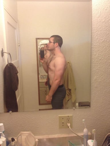 A photo of a 6'0" man showing a snapshot of 187 pounds at a height of 6'0