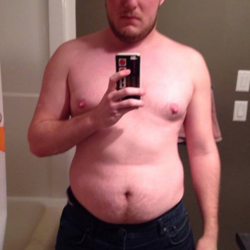 A photo of a 5'9" man showing a weight reduction from 235 pounds to 185 pounds. A total loss of 50 pounds.