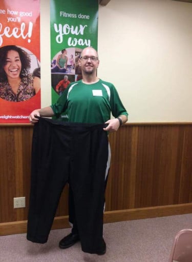 A progress pic of a 6'8" man showing a fat loss from 366 pounds to 256 pounds. A total loss of 110 pounds.