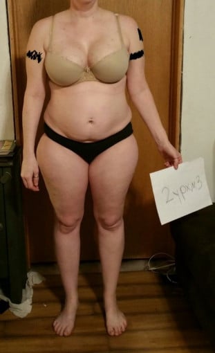 A photo of a 5'5" woman showing a snapshot of 169 pounds at a height of 5'5
