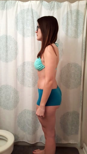 A progress pic of a 5'2" woman showing a snapshot of 119 pounds at a height of 5'2