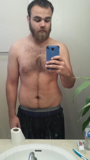 A photo of a 5'11" man showing a fat loss from 215 pounds to 180 pounds. A respectable loss of 35 pounds.