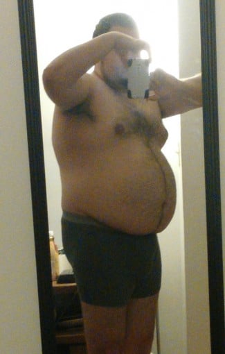 A photo of a 5'11" man showing a weight cut from 280 pounds to 179 pounds. A net loss of 101 pounds.