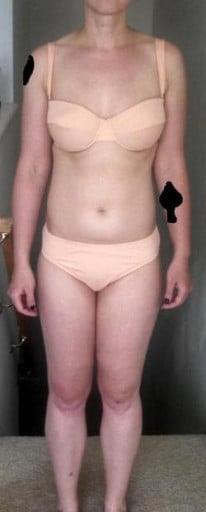 A progress pic of a 6'0" woman showing a snapshot of 155 pounds at a height of 6'0