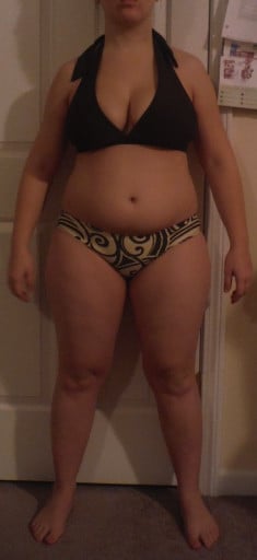 A progress pic of a 5'4" woman showing a snapshot of 166 pounds at a height of 5'4