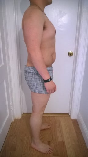 A progress pic of a 5'7" man showing a snapshot of 195 pounds at a height of 5'7