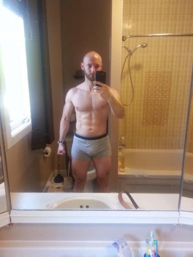 A photo of a 5'9" man showing a weight reduction from 180 pounds to 161 pounds. A total loss of 19 pounds.