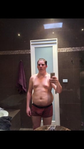 A picture of a 6'1" male showing a weight reduction from 250 pounds to 189 pounds. A respectable loss of 61 pounds.