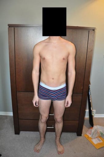 A progress pic of a 5'11" man showing a snapshot of 148 pounds at a height of 5'11