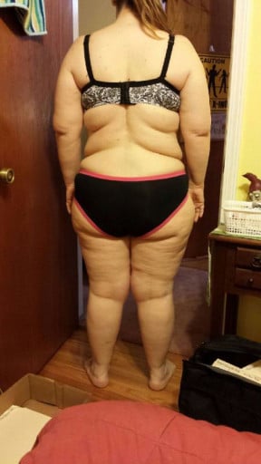 A progress pic of a 5'3" woman showing a snapshot of 228 pounds at a height of 5'3