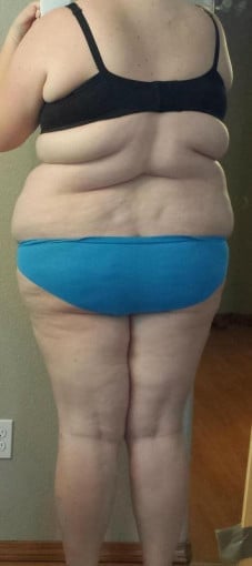 A progress pic of a 5'11" woman showing a snapshot of 320 pounds at a height of 5'11