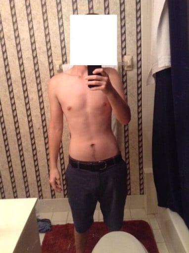 A before and after photo of a 5'11" male showing a weight cut from 155 pounds to 150 pounds. A net loss of 5 pounds.