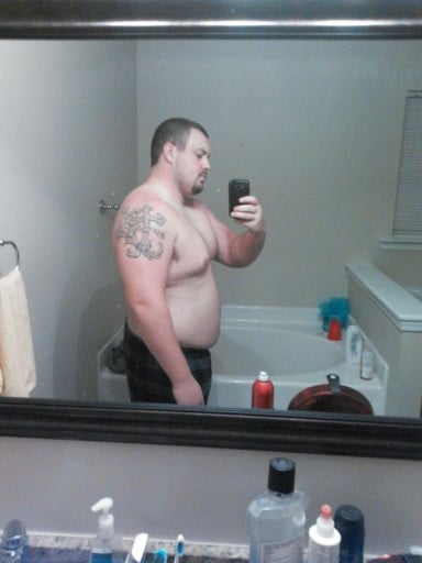 A photo of a 5'11" man showing a weight loss from 273 pounds to 238 pounds. A net loss of 35 pounds.