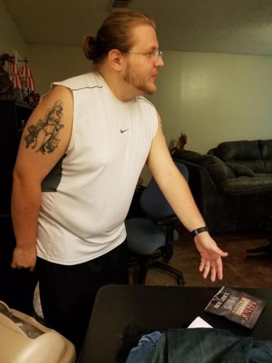 A photo of a 5'11" man showing a fat loss from 350 pounds to 288 pounds. A net loss of 62 pounds.