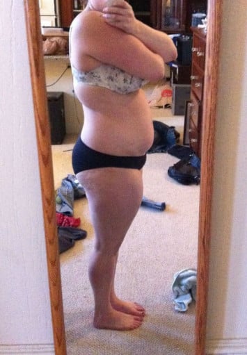 A photo of a 5'9" woman showing a weight reduction from 220 pounds to 205 pounds. A respectable loss of 15 pounds.