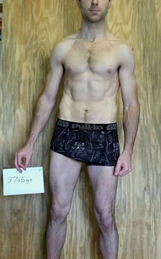 A photo of a 6'1" man showing a snapshot of 167 pounds at a height of 6'1