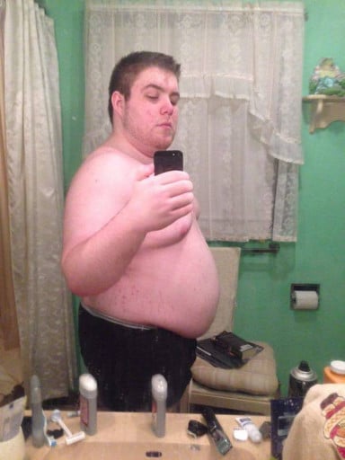 A progress pic of a 5'10" man showing a weight reduction from 305 pounds to 205 pounds. A respectable loss of 100 pounds.