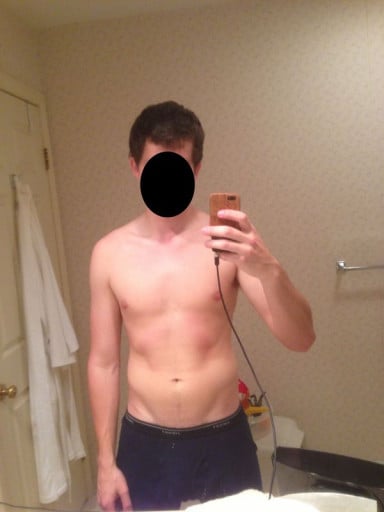 A photo of a 5'11" man showing a weight reduction from 195 pounds to 165 pounds. A total loss of 30 pounds.