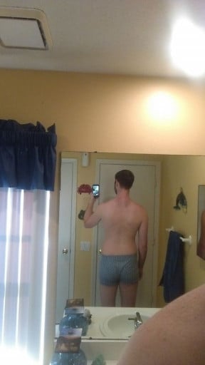 A progress pic of a 6'6" man showing a weight cut from 260 pounds to 215 pounds. A respectable loss of 45 pounds.