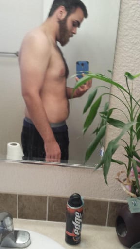 A photo of a 5'11" man showing a fat loss from 215 pounds to 180 pounds. A respectable loss of 35 pounds.